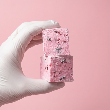 Marshys de Pikota de Frezzyks en una mano